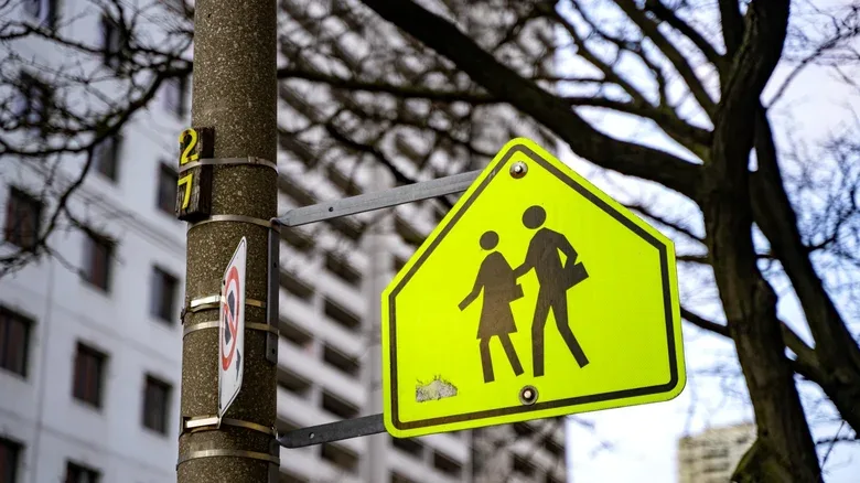 Why School Zone Signs Are That Eye-Searing Fluorescent Yellow-Green Color