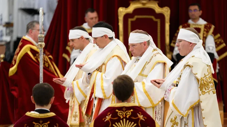 Dueling Popemobiles inches closer as Catholic schism deepens