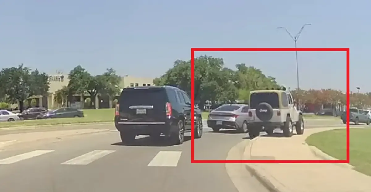 Round Rock, TX: Hesitant Driver on I-35 Frontage Road Freezes Instead of Merging, Jeep Wrangler Attempts Curb-Hop Overtake, Nearly Causes Crash