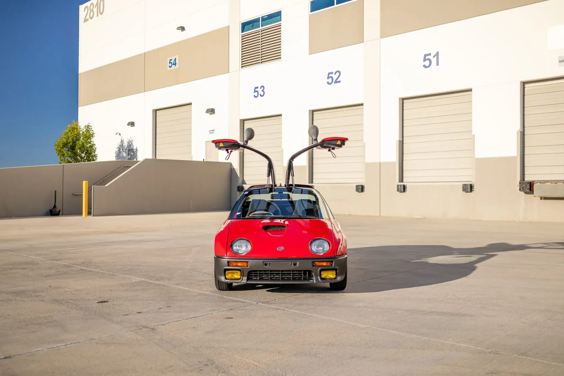Suzuki’s pint-sized mid-engine supercar with gullwing doors packs just 64 HP