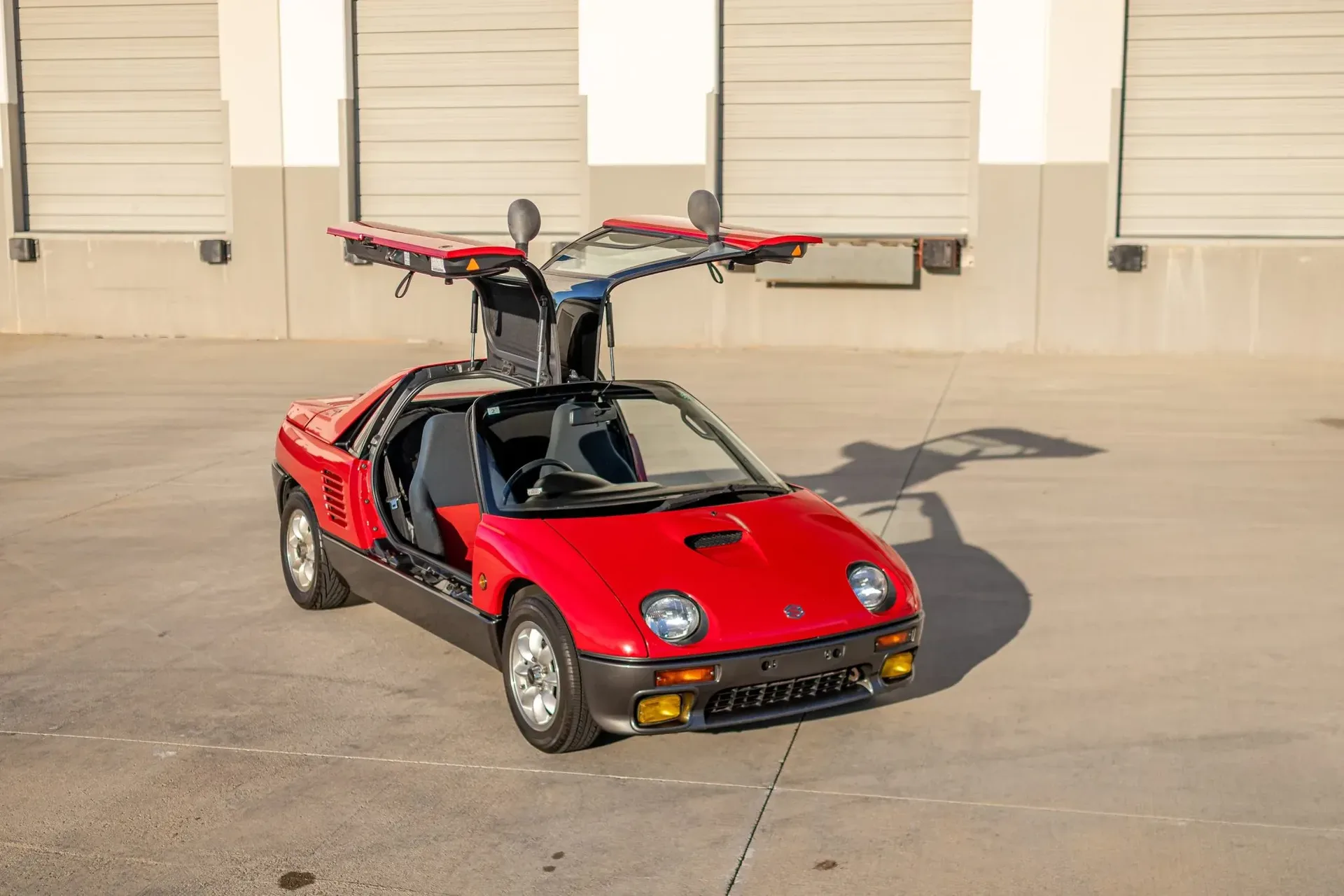 Suzuki’s pint-sized mid-engine supercar with gullwing doors packs just 64 HP