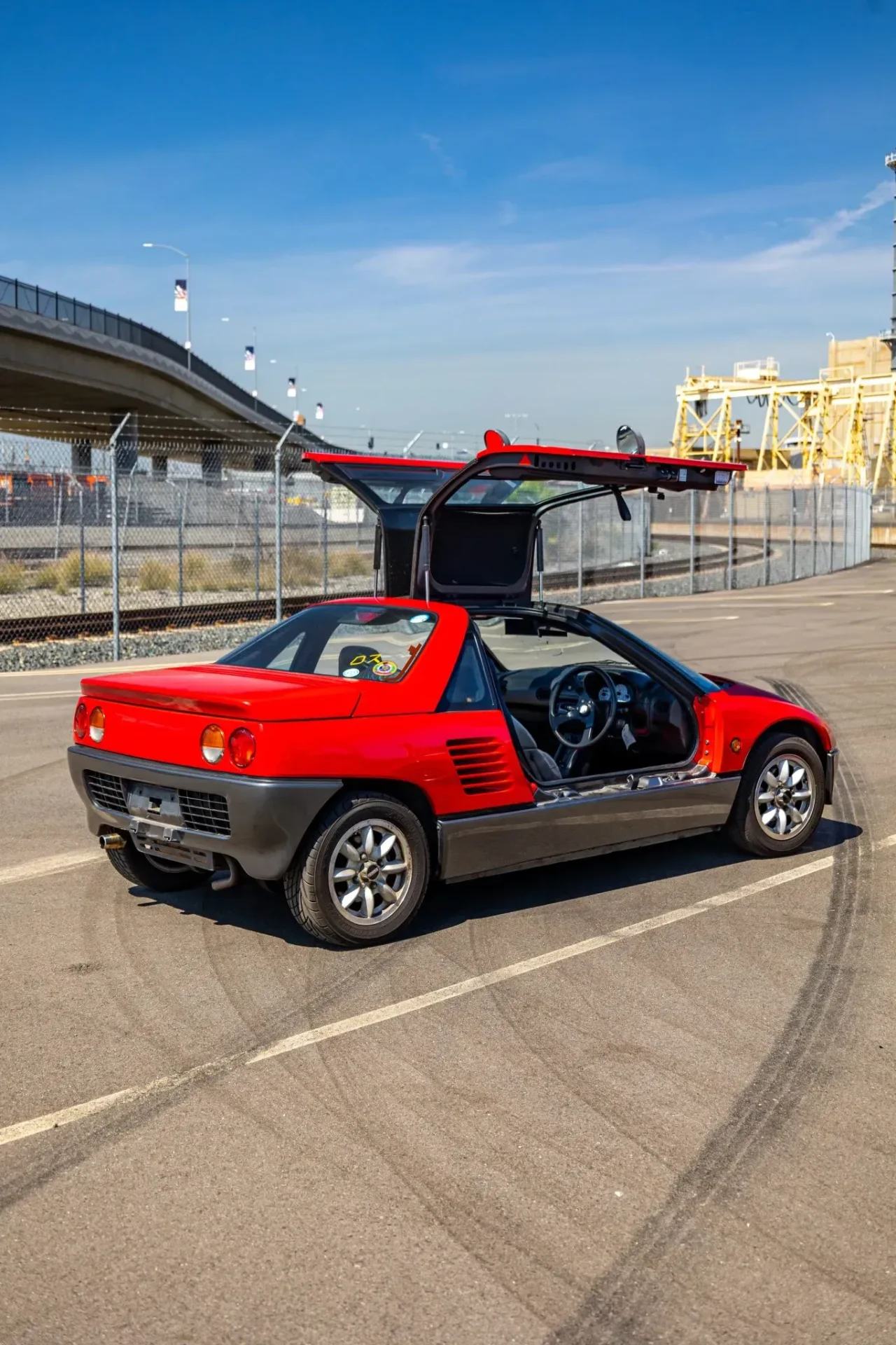 Suzuki’s pint-sized mid-engine supercar with gullwing doors packs just 64 HP