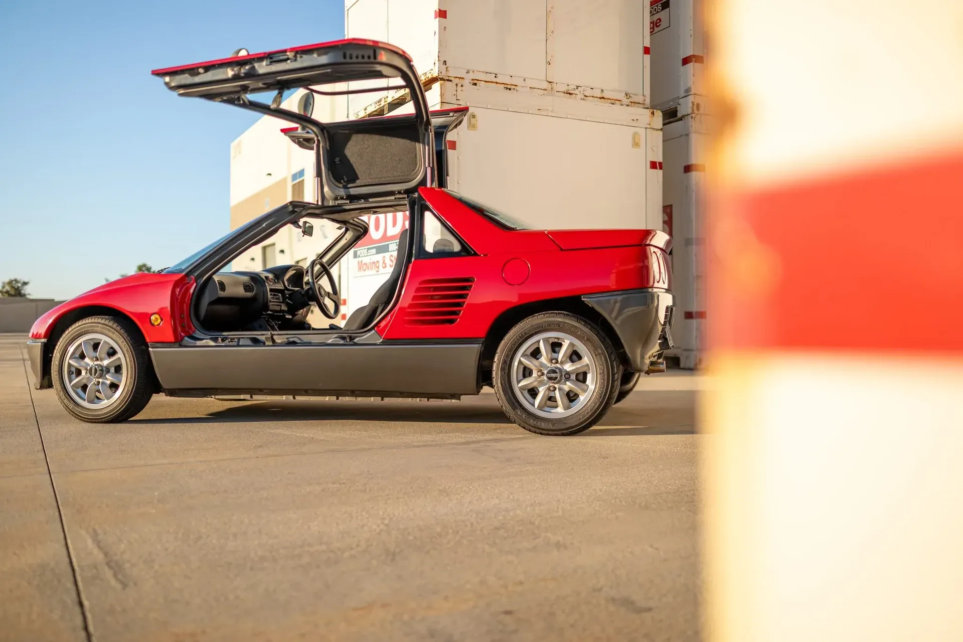 Suzuki’s pint-sized mid-engine supercar with gullwing doors packs just 64 HP