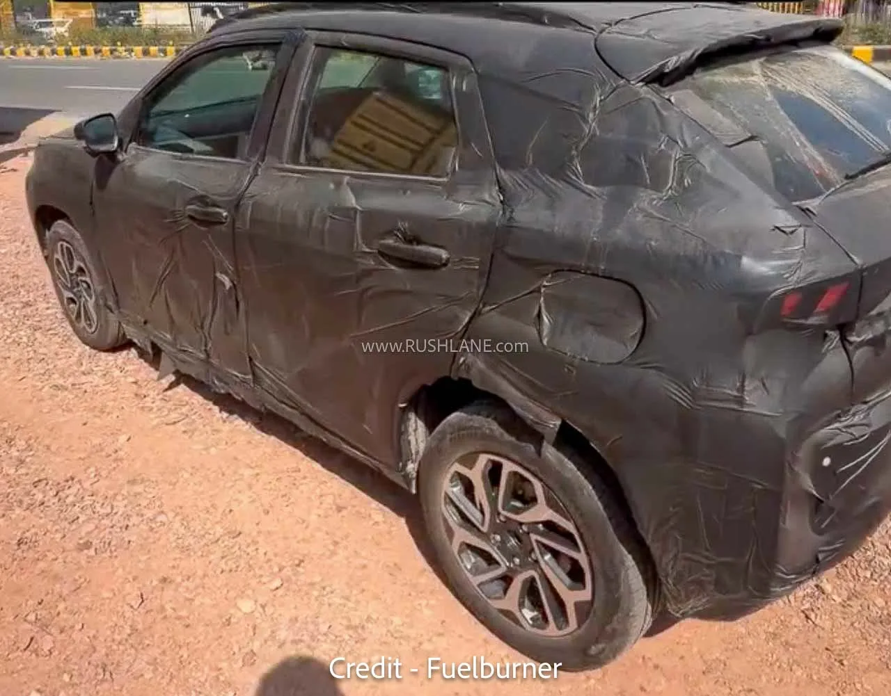Maruti Fronx Facelift (2027), surprins în teste cu ADAS, un nou motor de 1,2 litri și frâne pe disc pe spate