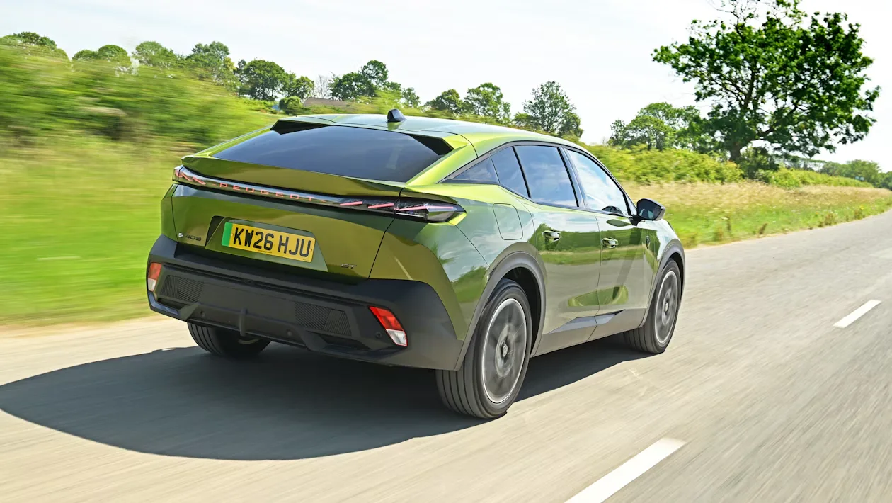 Peugeot E-408 facelift spied testing in the UK — new pictures