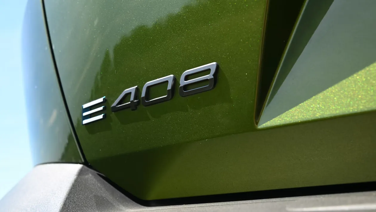 Peugeot E-408 facelift spied testing in the UK — new pictures