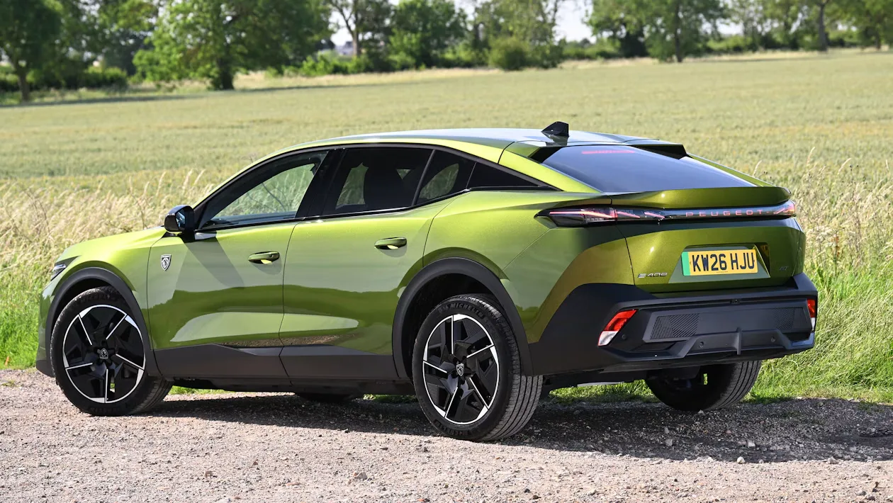 Peugeot E-408 facelift spied testing in the UK — new pictures