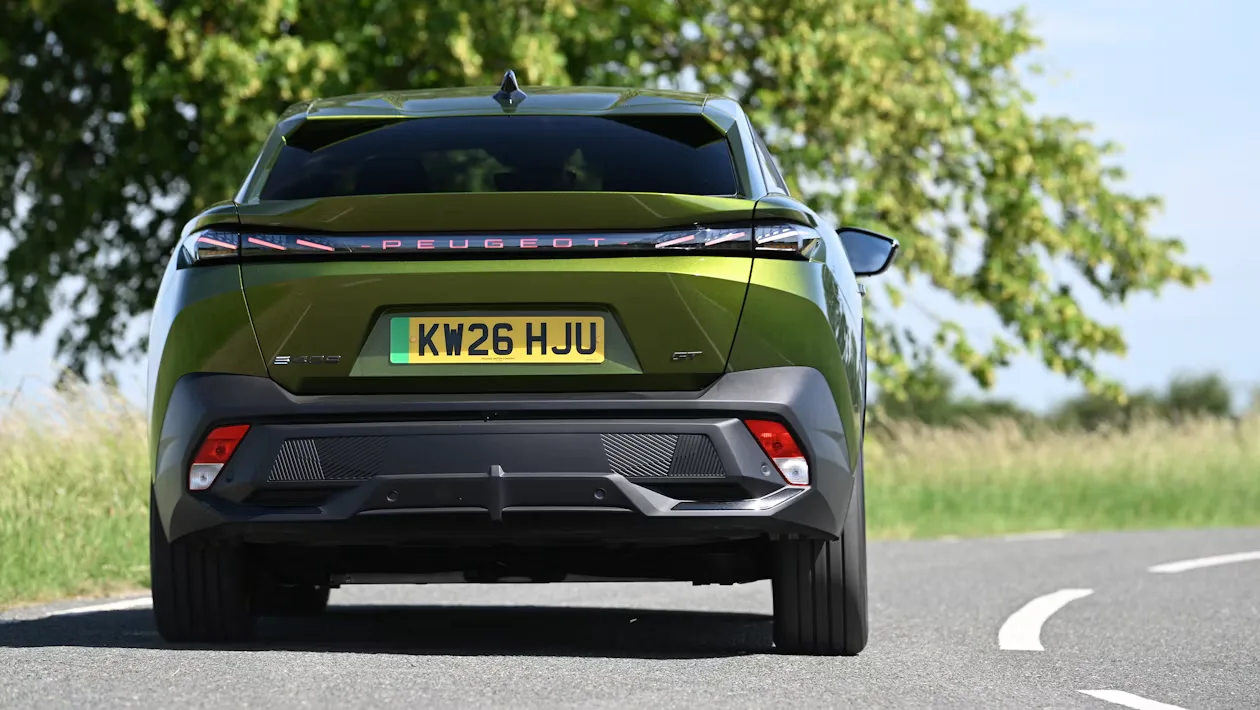 Peugeot E-408 facelift spied testing in the UK — new pictures