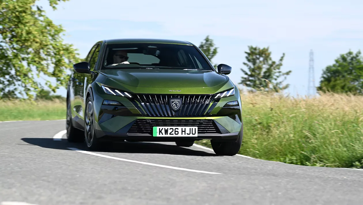 Peugeot E-408 facelift spied testing in the UK — new pictures