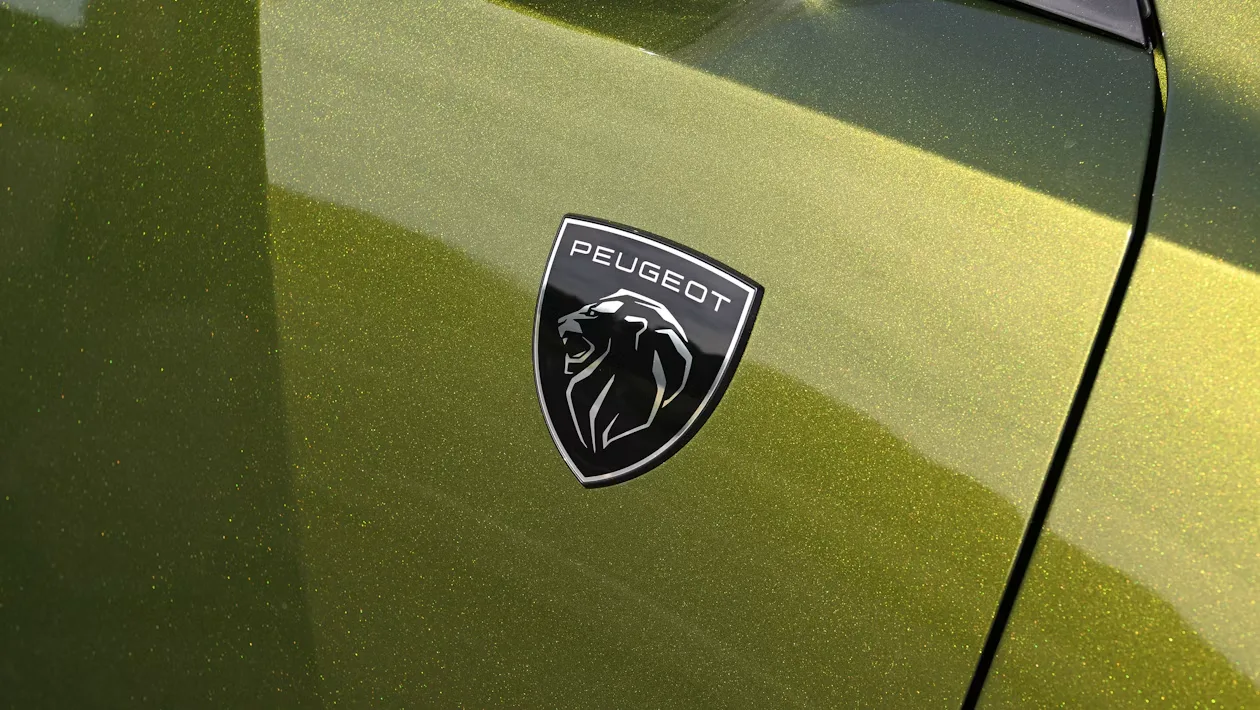Peugeot E-408 facelift spied testing in the UK — new pictures